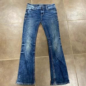 Buckle black boot cut jeans